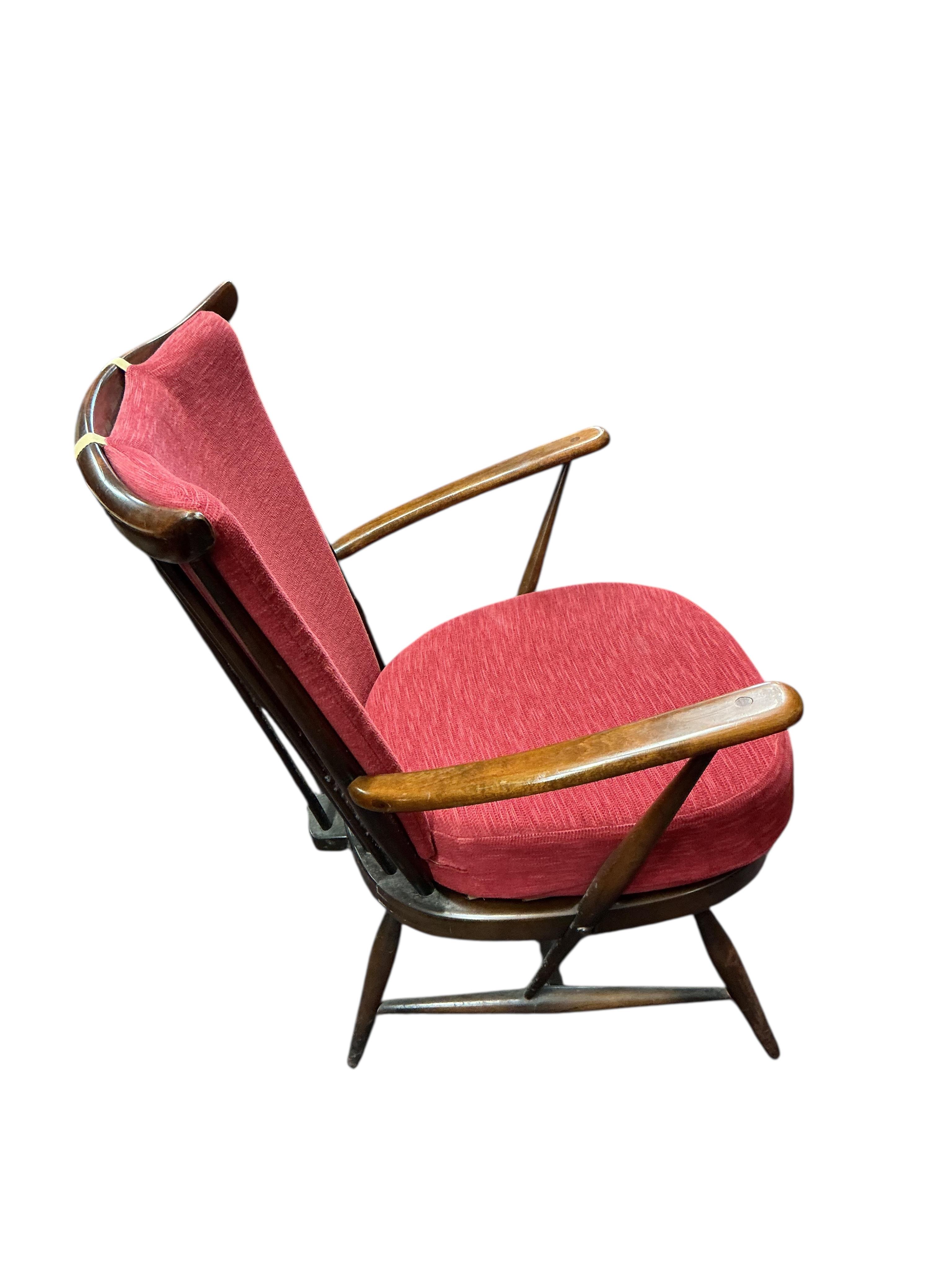 A pair of Ercol armchairs, width 70cm, depth 60cm, height 86cm